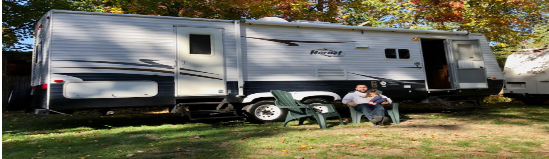 adventurous RV sale, eager buyer, excitement in the air, photorealistic, outdoor dealership with flags fluttering in the breeze, highly detailed, test drive preparation, bright primary colors, sharp sunlight, shot with a zoom lens.